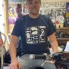 Model wearing a navy scooter t-shirt with Made In Italy on
