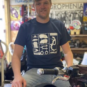 Model wearing a navy scooter t-shirt with Made In Italy on